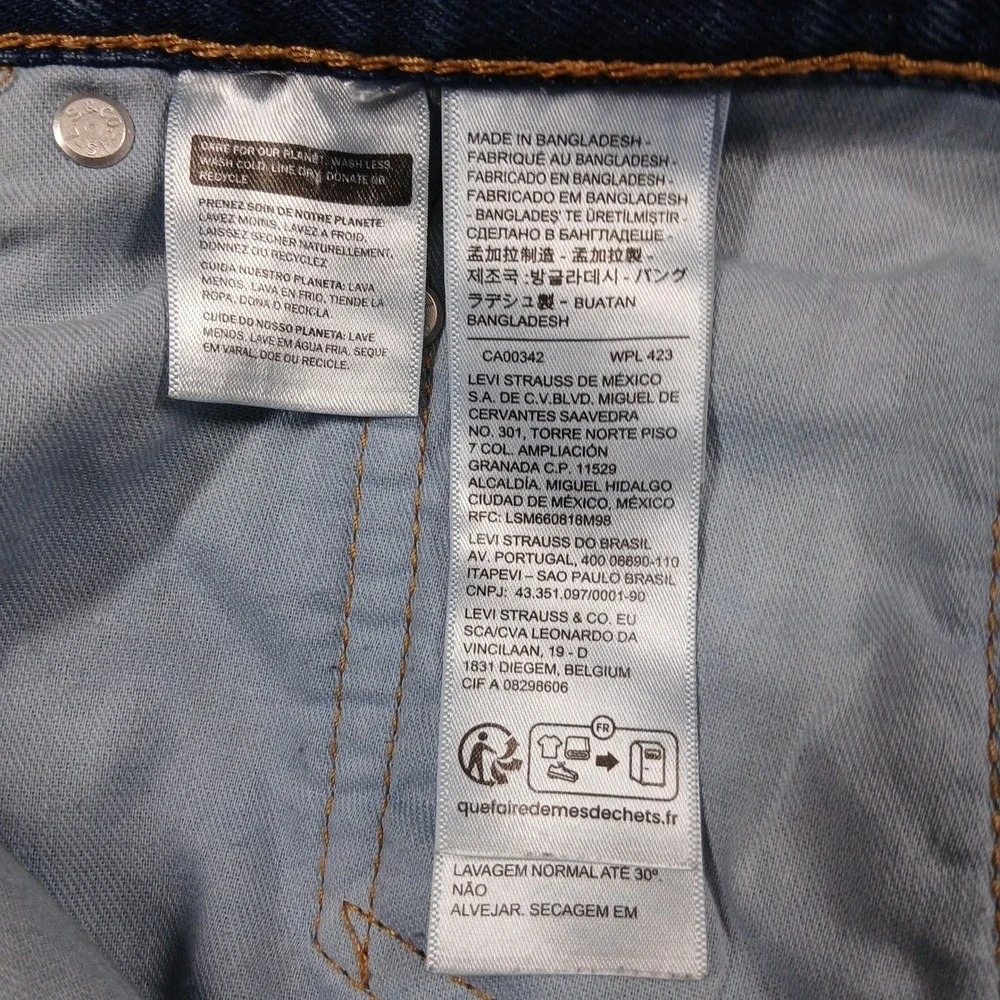 Levi's 550 Relaxed Fit Tapered Leg‎ Jeans Mens 50x30 Medium Wash Blue Denim EUC